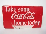 1950s Take Some Coca-Cola Home Today single-sided die-cut tin bottle rack sign.