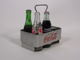 Circa 1940s Drink Coca-Cola stainless steel six-pack carrier made by Action Mfg.