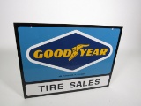 Circa 1960s Goodyear Tire Sales double-sided tin sign with winged foot logo.