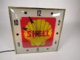 Highly prized late 1950s-early 60s Shell Oil service station light-up clock by Pam Clock Company.