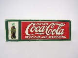 Drink Coca-Cola Delicious and Refreshing single-sided tin sign with bottle graphic.
