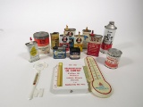 Large lot consisting of 12 vintage handy oilers/tins and three promotional thermometers.