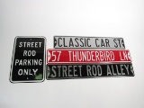 Lot of four reproduction embossed metal street signs.