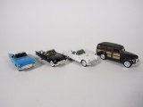 Lot of three Ertl 1957 Ford Thunderbirds and a 1940 Ertl Ford Woody.