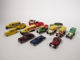 Box of 13 various die-cast and plastic delivery trucks and cars.