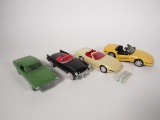 Lot consisting of two 1:24 scale GM Corvette dealer promotional, Maverick promotional and a Pace Car