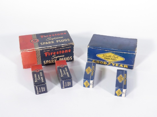 Lot of two circa 1930s-40s automotive garage spark plug display boxes.