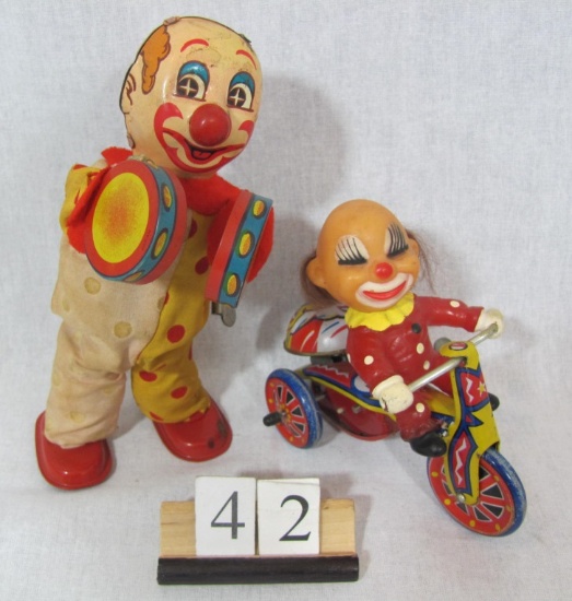 "1 lot of 2. Clowns - wind up Clown sways side to side and plays cymbol wit