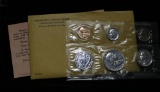 1961 Proof Set in original mint packaging with the envelope and mint memo Grades