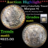 ***Auction Highlight*** 1882-p Colorfully Toned Morgan Dollar $1 Graded ms65 By SEGS (fc)