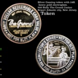 Silver Gaming token with 24K heavy gold electroplate. $40 Bally The Grand Casino Resort Atlantic cit