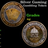 Silver Gaming token with 24K heavy gold electroplate $40 Trump Plaza Atlantic City, NJ Grades