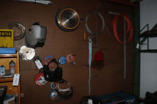 Peg Board Wall of Assorted Cut off Tools