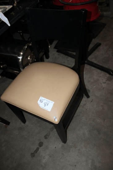 Black Chairs with Beige Cushions