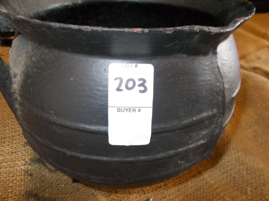 THREE LEGGED CAST IRON POT