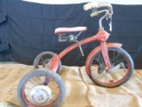RED AND WHITE TRICYCLE