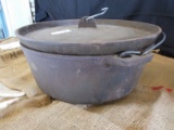 THREE LEGGED CAST IRON 14IN DUTCH OVEN