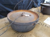 THREE LEGGED CAST IRON 12IN DUTCH OVEN