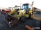NEW HOLLAND 555E BACKHOE 4WD, C/H/A, HYDRAULIC EXTENDING BOOM, 7271 HOURS, S/N 031027088, TAG #8867