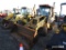 NEW HOLLAND 555E BACKHOE 4WD, ROPS, SHOWING 3202HRS, TAG #8126