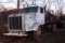 PETERBILT ROAD TRACTOR W/ TANK AND REELS, NEEDS REPAIR