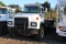 1999 MACK RD 688 ROLL OFF TRUCK 8LL TRANS, MACK E7 ENGINE, 350 HP, TRI AXLE, LOAD SCALES & PRINTER,