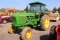 JOHN DEERE 4230 2WD CAB TRACTOR 540 PTO, DUAL REMOTES, ROW CROP AXLES, SHOWING 2439 HRS, S# 055747R,