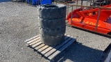 QTY 4) SOLID BASS FLAT FREE SKID STEER TIRES