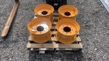 QTY 4) 165 X 9.75 8 LUG SKID STEER WHEELS