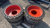 QTY 4) SKID STEER SOLID TIRES AND WHEELS