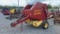 NEW HOLLAND 638 4'X4' ROUND BALER