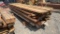 STACK OF ROUGH CUT LUMBER
