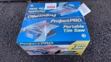 UNUSED PROJECT PRO TILE SAW IN BOX