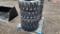 QTY 4) 10X16.5 SKID STEER TIRES