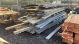 STACK OF ASSORTED ROUGH CUT LUMBER