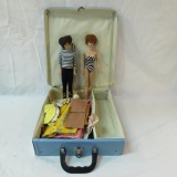 2 vintage Bubblecut Barbie's in case with clothing