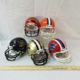 Five NFL mini helmets