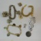 4 charm bracelets with some charms