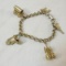 Signed Coro wagon train charm bracelet