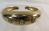 Signed Coro gold tone double hinged cuff bracelet