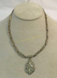 Antique gold tone necklace with rhinestones