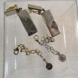 Signed Givenchy clip earrings and 2 chain tags