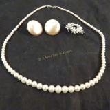 Faux pearl necklace, earrings, and brooch