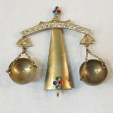 Vintage scale brooch with colored stones