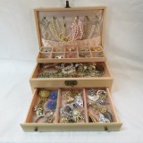 Vintage jewelry box full of jewelry