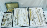Vintage jewelry box with assorted jewelry