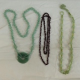 2 Jade & 1 Garnet necklaces, 1 jade is 2 tone