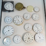 12 pocket watch movements, 1 case & 1 dial