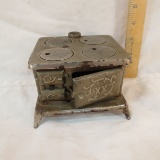 Miniature cast metal antique stove