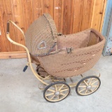 Vintage wicker baby-carriage needs work